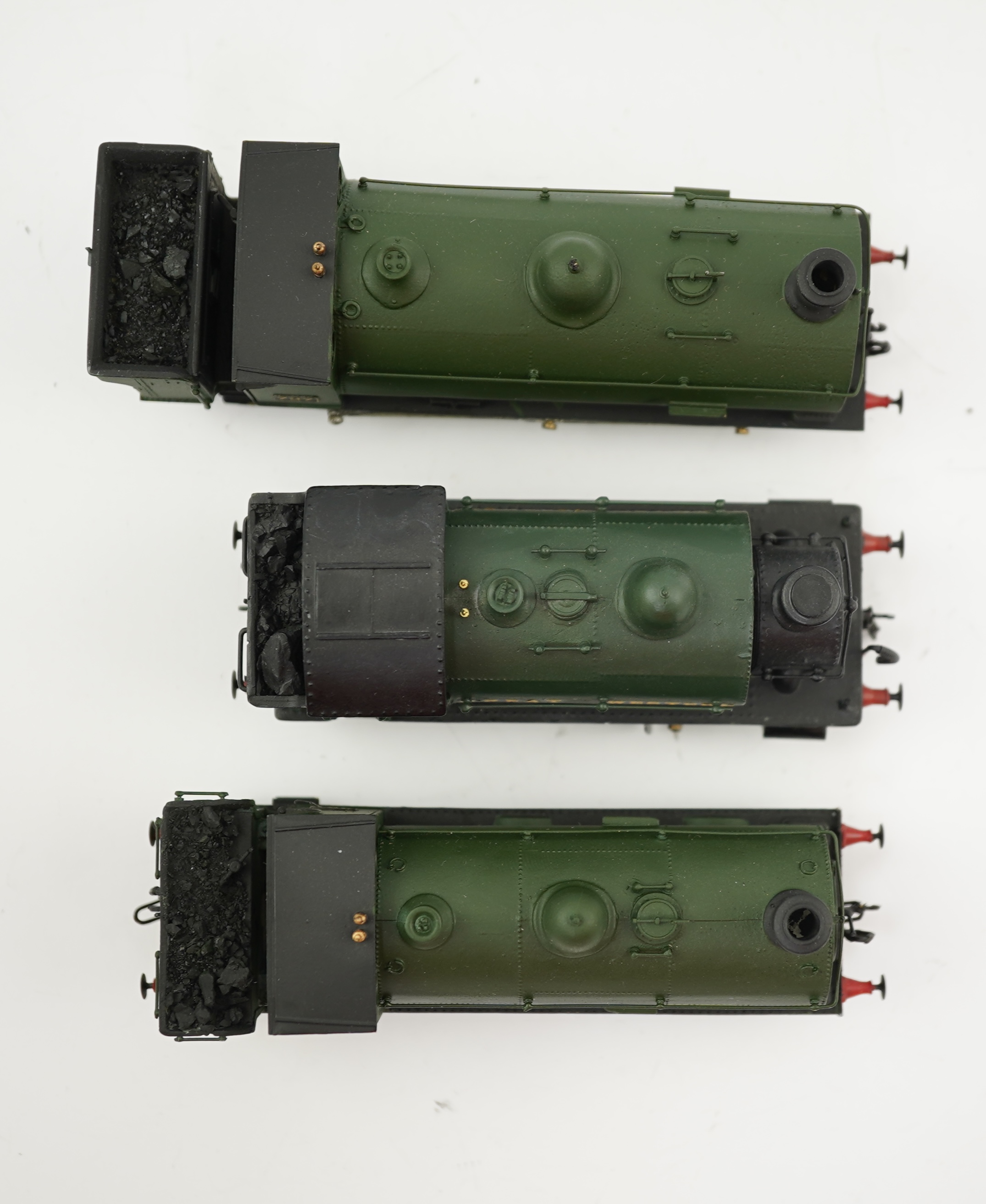 Three 00 gauge brass and white metal kit built GWR saddle tank locomotives; a 1361 class 0-6-0ST, 1362, together with an 850 class 0-6-0ST, 851, and a 727 class 0-6-0ST, 727, constructed, painted and lined to a high stan